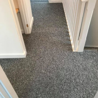 grey carpet on a landing