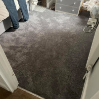 grey carpet fitted in a bedroom