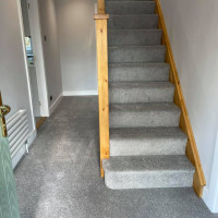 grey carpet floor and stairs