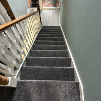 dark grey carpet on stairs