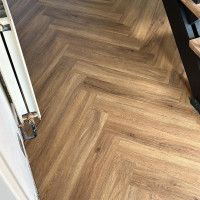 herringbone floor fitted in a hallway